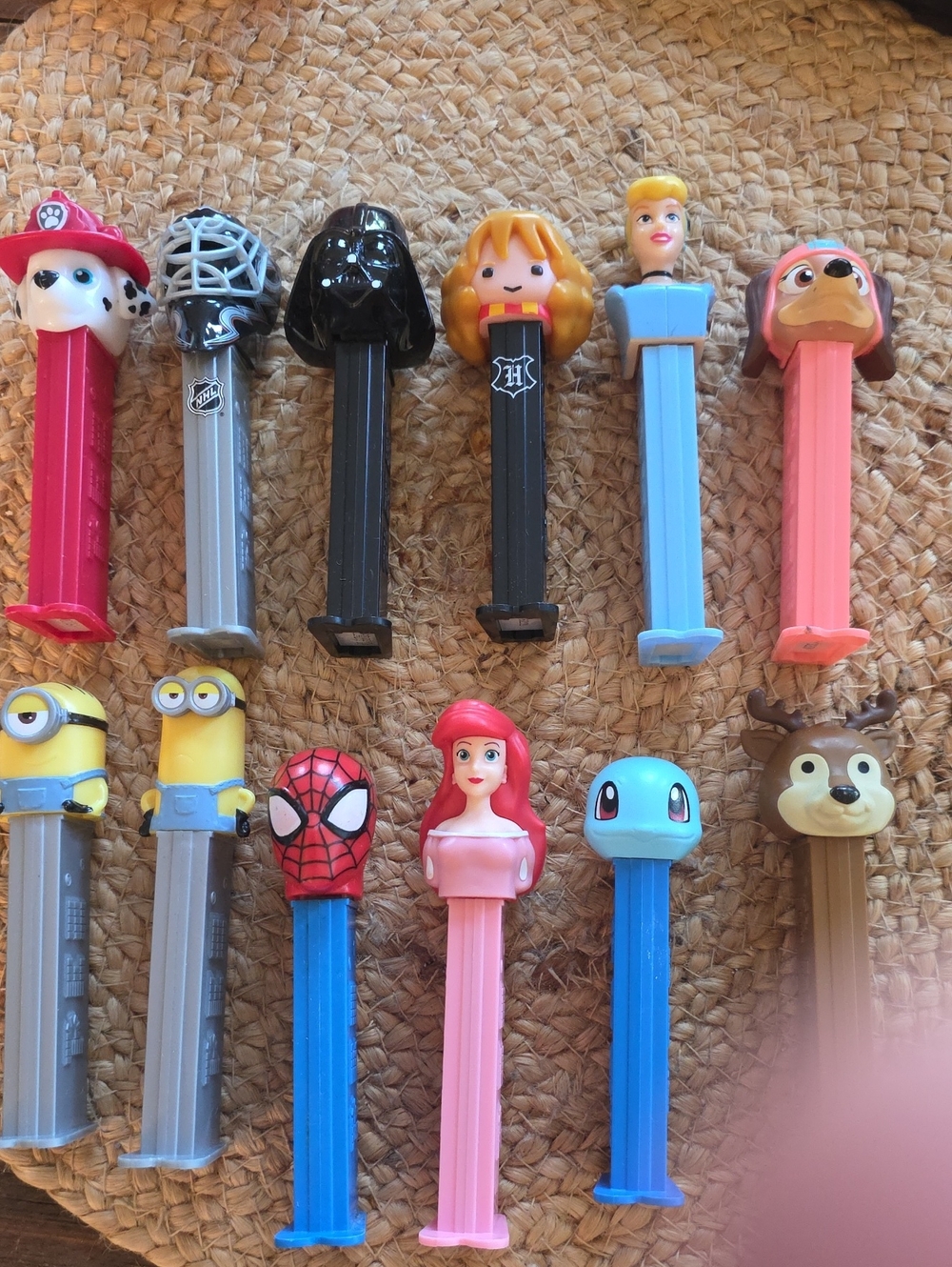 12 PEZ dispensers Minions Cinderella Paw Patrol Spiderman NHL Etc